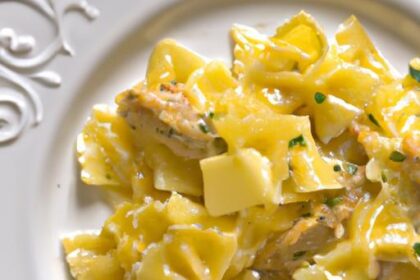 Savor Farfalle with Chicken and Roasted Garlic Delight