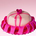 Sweet Elegance: Crafting the Perfect Heart Pink Cake with Bow