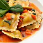 Indulge in Creamy Tuscan Ravioli: A Savory Italian Delight