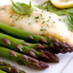 Zesty Baked Cod with Asparagus in Lemon Butter Sauce